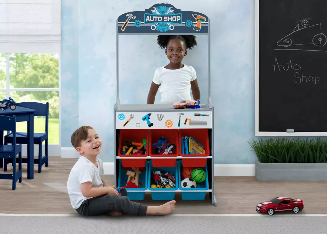 Delta Children Reversible 4-in-1 Pretend Play Center With Chalkboard & Storage What's New 4 Delta Children Reversible 4-in-1 Pretend Play Center With Chalkboard & Storage What's New