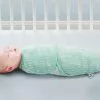 Delta Children Little Lambs Adjustable Swaddle Wrap - Size Small/Medium, Fits Babies 0-3 Months/7-14 Lbs. Swaddles