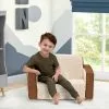Delta Children Cozee Flip-Out Sherpa And Leather 2-in-1 Convertible Chair To Lounger For Kids What's New