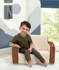 Delta Children Cozee Flip-Out Sherpa And Leather 2-in-1 Convertible Chair To Lounger For Kids What's New